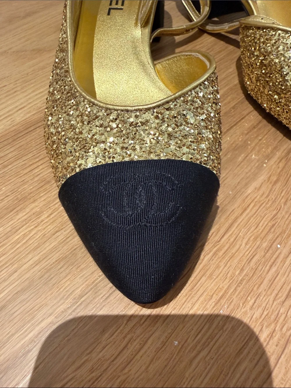 CHANEL Gold Glitter Slingback Mules with Black Cap Toe